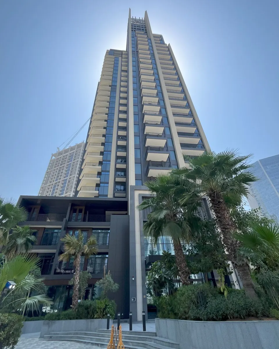 Ahad Residences tower and its landscaped entrance on Marasi Drive, Business Bay